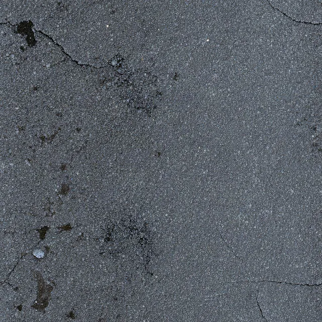 Dark cracked asphalt