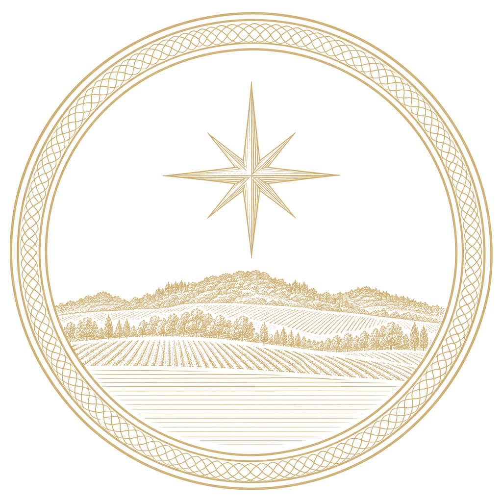 The Maison Vesprée emblem: an eight-pointed evening star rising over the engraved horizon of the Montagne de Reims, inside a guilloché ring