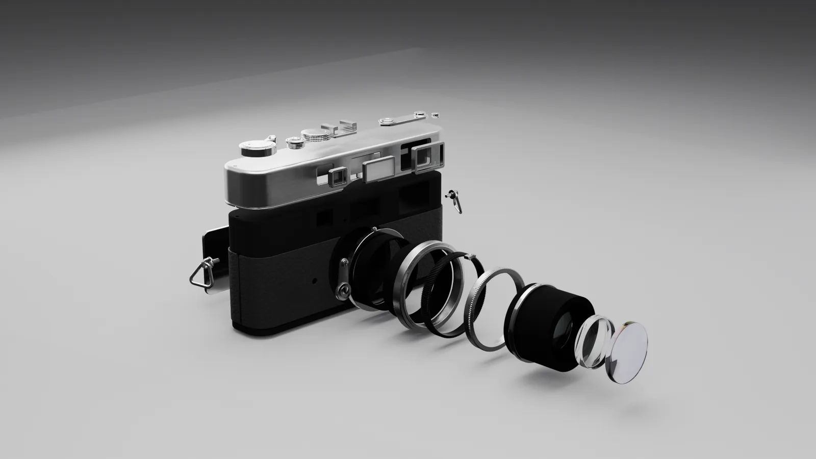 Exploded view: lens rings, top controls and plates on their own axes
